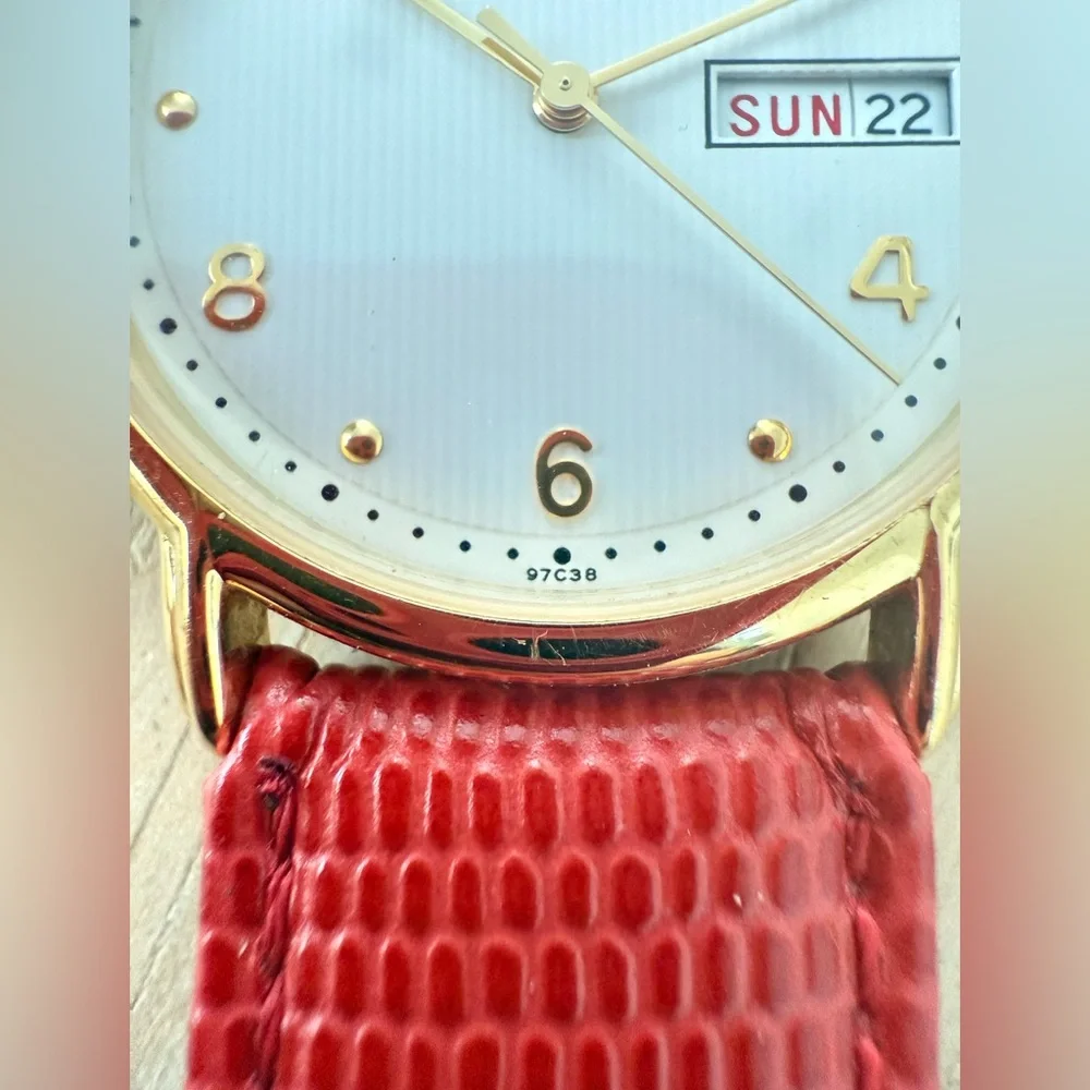 Bulova gold tone red leather watch NEW BATTERY